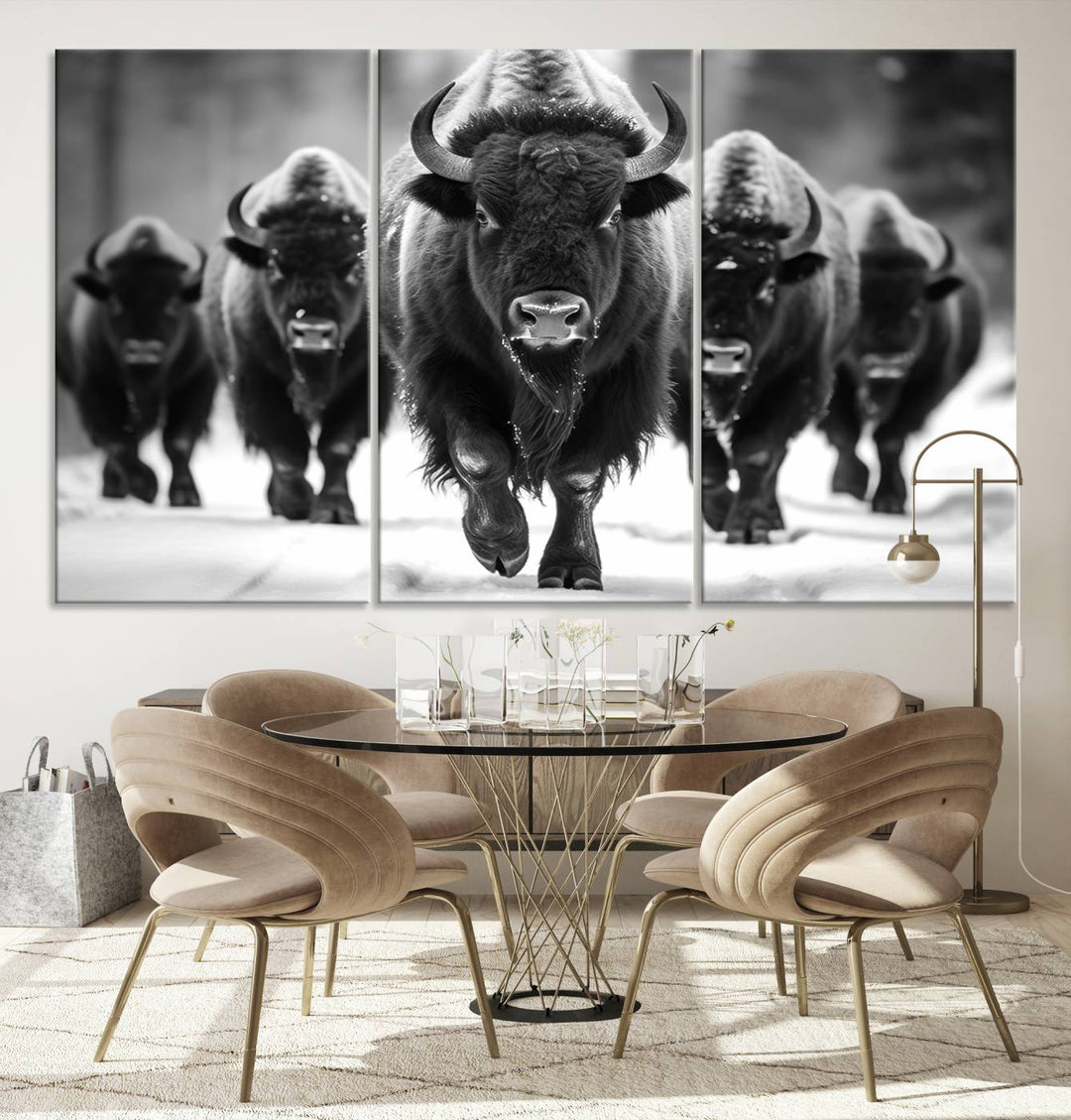 A modern living room features a striking black-and-white American Bison Art | Buffalo Herd Wall Art Canvas Print on the wall.