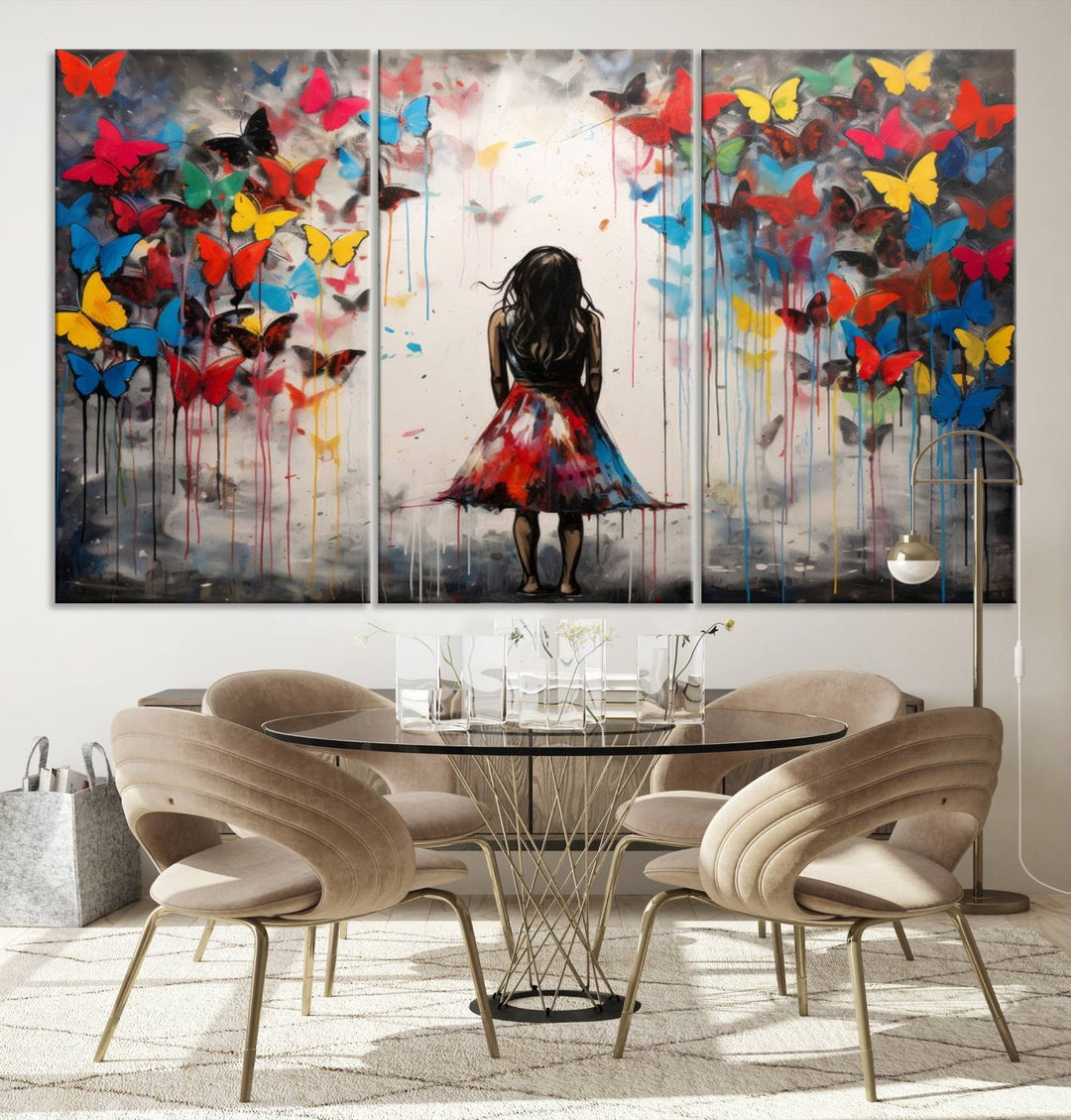 The Girl Butterfly Graffiti Abstract Canvas Print, featuring a vibrant depiction of a girl surrounded by butterflies on museum-quality canvas, is displayed prominently.