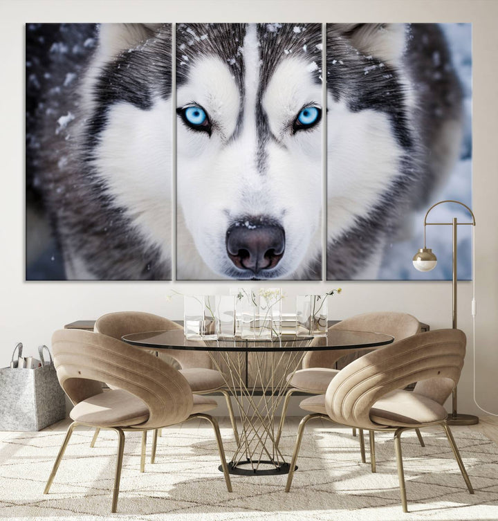 A large framed Winter Siberian Husky Wolf Wall Art Canvas Print, an exquisite piece of animal portrait decor, hangs prominently on the wall.