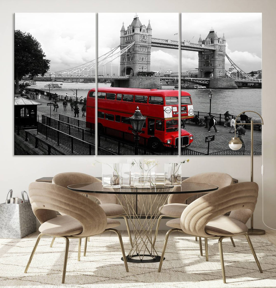 The London Red Bus and Bridge Wall Art Canvas Print showcases a red London bus in front of Tower Bridge, beautifully presented as a gallery-wrapped canvas. This striking image is divided into three panels, delivering a museum-quality display that's ready to hang.