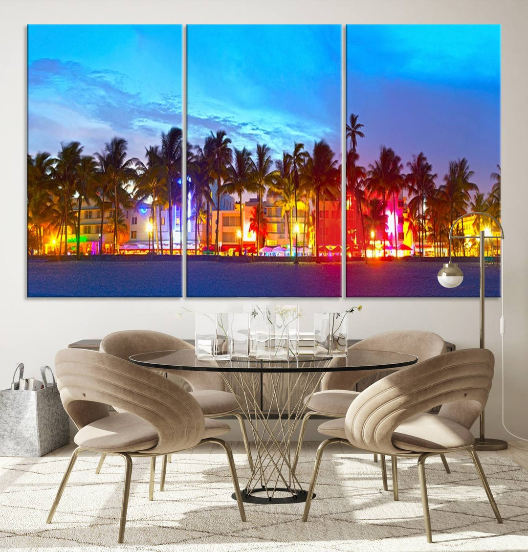 The living room features a three-panel Miami City Wall Art Canvas Print, showcasing a colorful, illuminated beach scene with palm trees on museum-quality canvas.