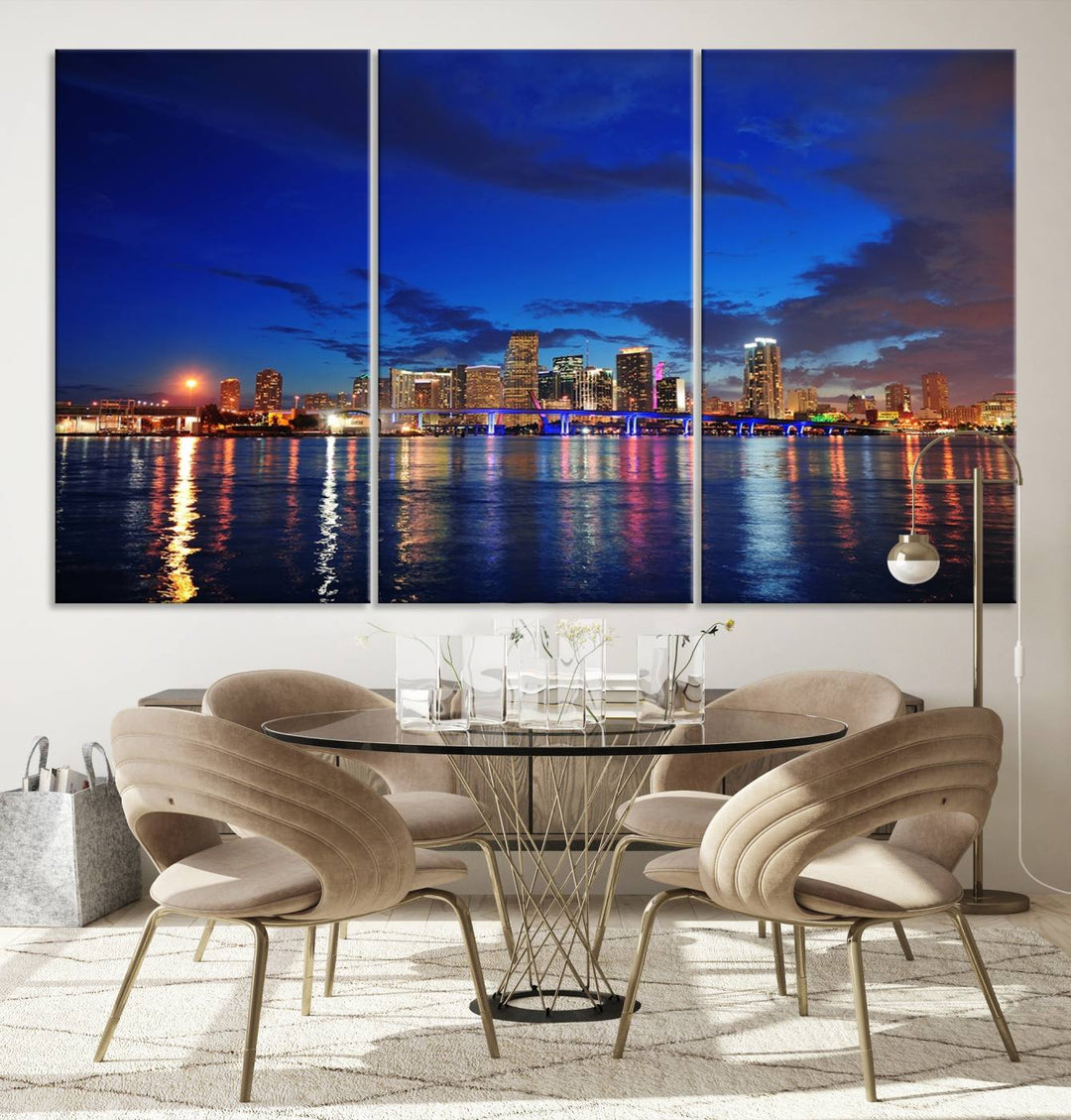 A large Miami City View Wall Art Canvas Print featuring the Miami City Skyline Panorama at night is displayed above the dresser.