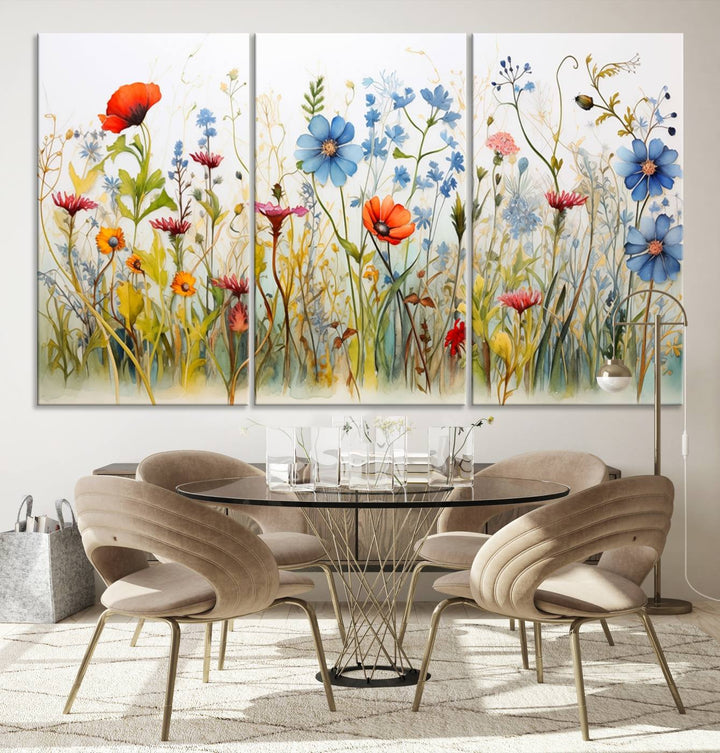 The Colorful Wildflower Canvas Wall Art – Vibrant Floral Botanical Print, consisting of a large 3 panel set, adds bright nature decor to the living room against a black wall.