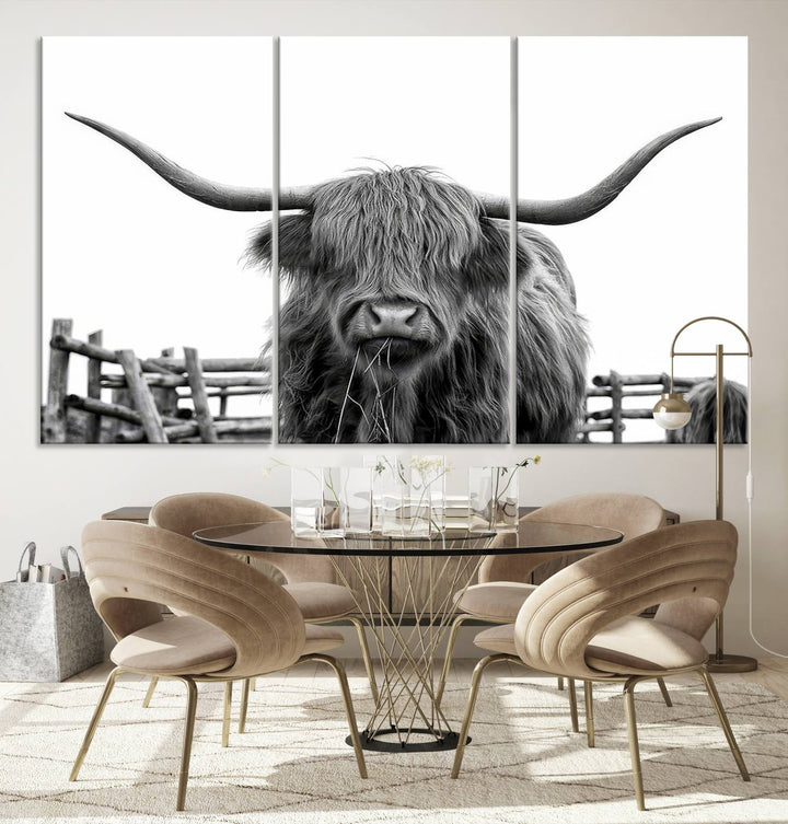 The Longhorn Canvas Print, featuring a black-and-white triptych of a Bighorn cow with shaggy fur and impressive long horns, is elegantly showcased. This wall art piece boasts a gallery-quality finish on premium canvas, bringing sophistication to any room.