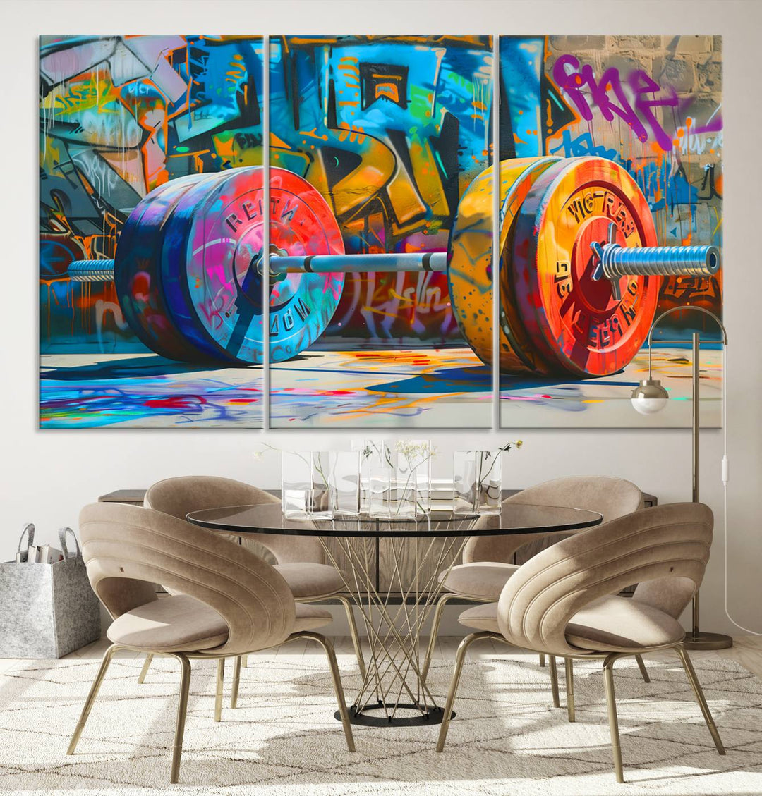 The Fitness Gym Barbell Graffiti Wall Art Canvas Print, a vibrant triptych featuring a barbell against a graffiti backdrop, elegantly hangs in the room. Crafted on premium canvas with a gallery-quality finish, this stunning piece of wall art effortlessly combines urban flair with sophisticated decor.