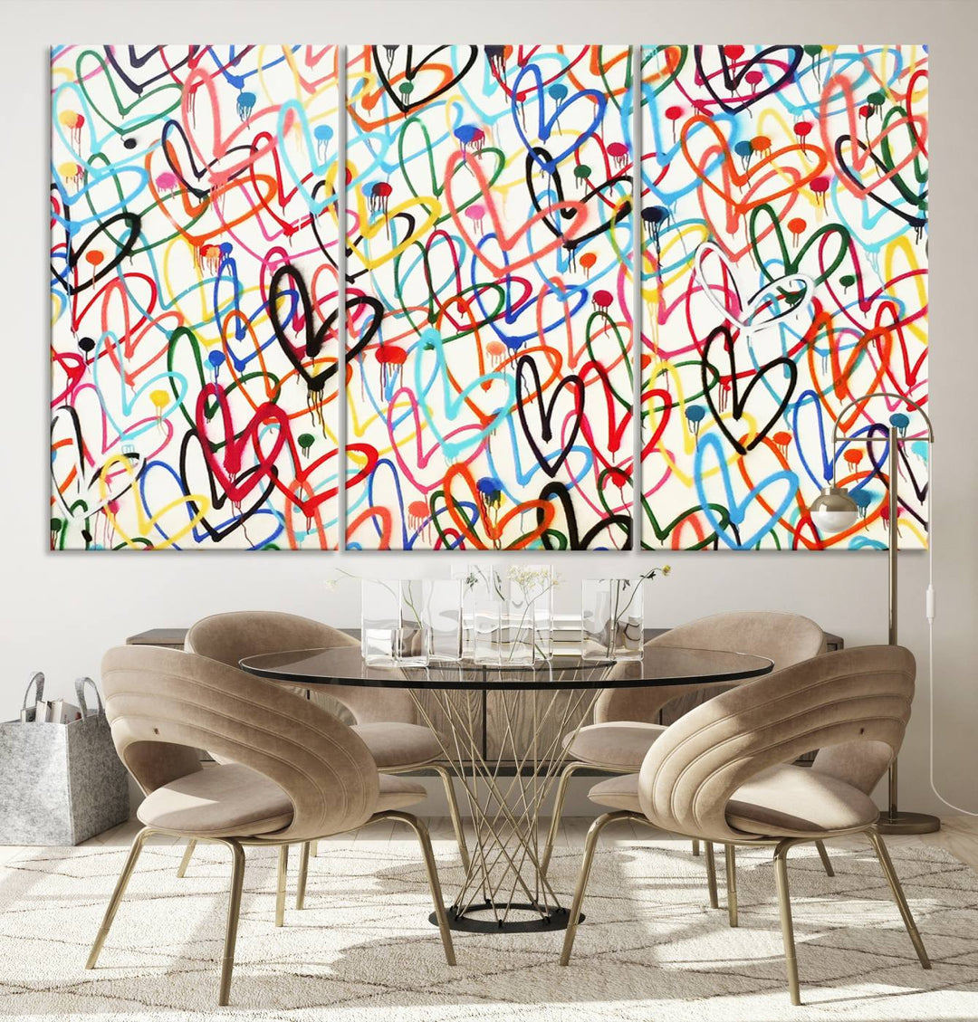 The "Colorful Love Canvas print," featuring vibrant abstract street art with overlapping loops, is handmade in the USA.