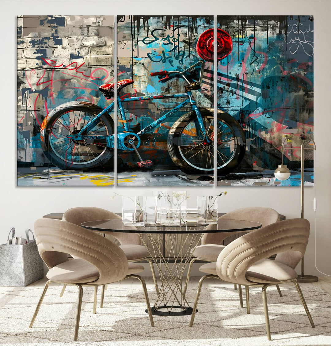 A modern living room features a triptych wall art of an abstract bicycle, designed in a graffiti style on a brick wall. This piece is expertly crafted on the Abstract Bicycle Wall Art Canvas Print, offering a premium canvas that ensures a gallery-quality finish.