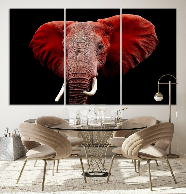 A Wall Art Canvas Print in the modern living room features a three-panel premium design of a red elephant face.