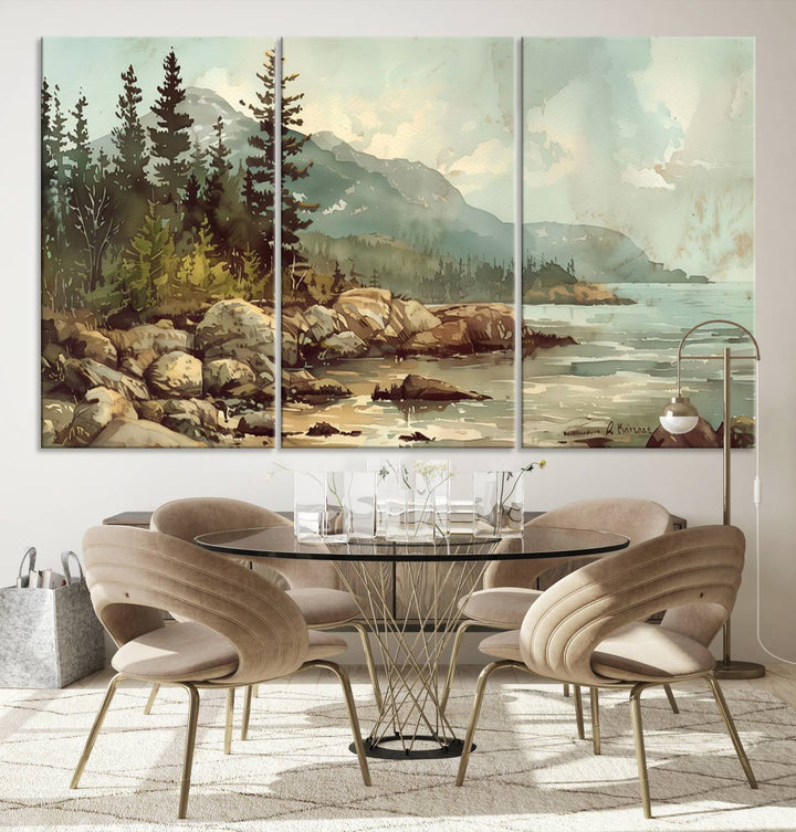 The living room features a breathtaking three-panel Abstract Acadia National Park Wall Art Canvas Print, which beautifully captures the rocky Maine coastline with trees and mountains.