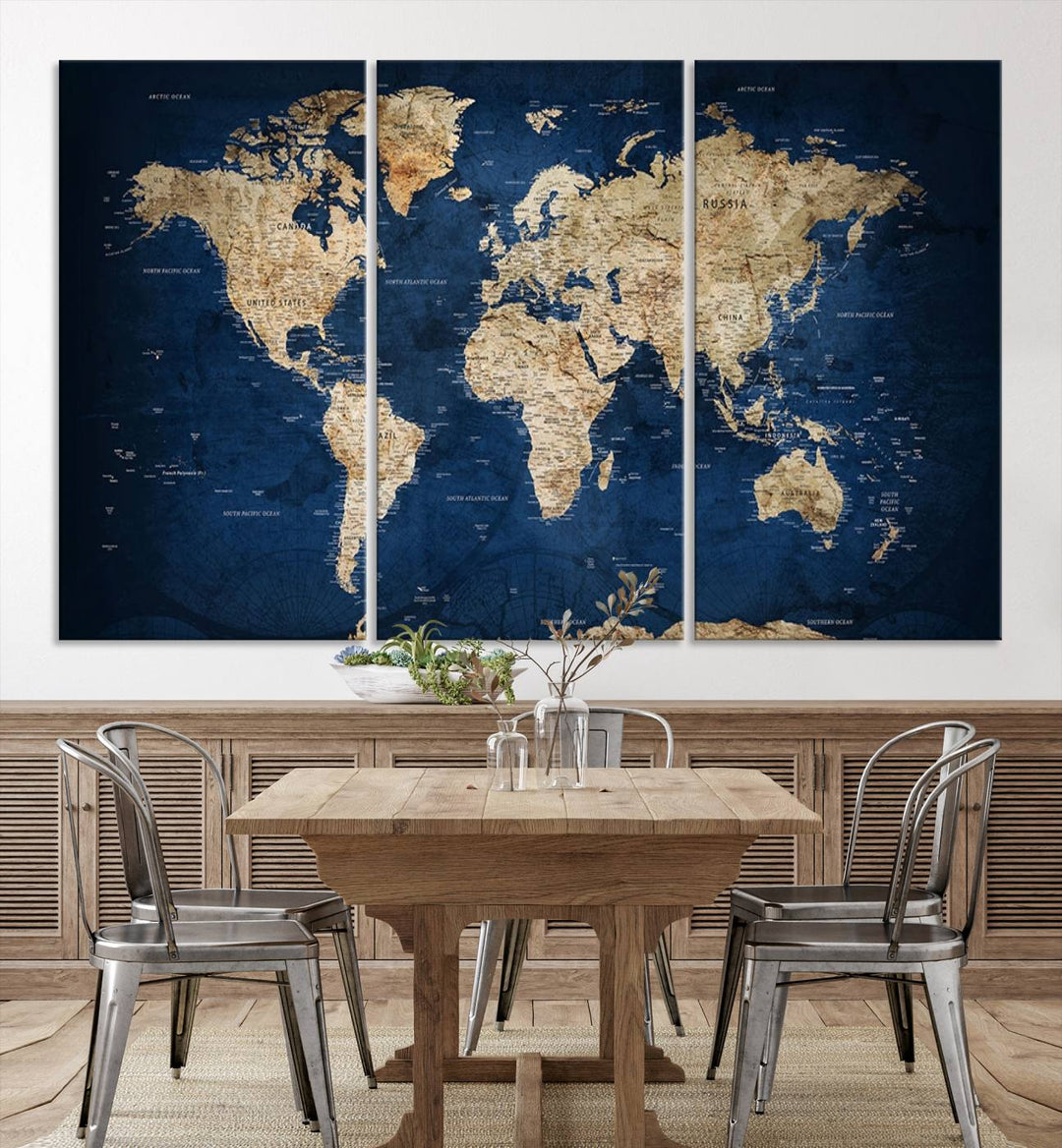 A triptych canvas print titled "Vintage Blue World Map Canvas Print - Classic World Map Design on Deep Blue Wall Art Print" adorns the wall, enhancing the decor with its antique style.