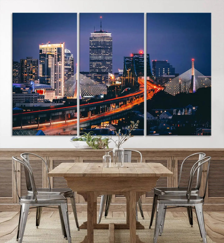 The "Boston City Lights Night Skyline Cityscape View" artwork on the wall showcases a brightly lit bridge at night. It is displayed on museum-quality canvas with a UV-protective coating.