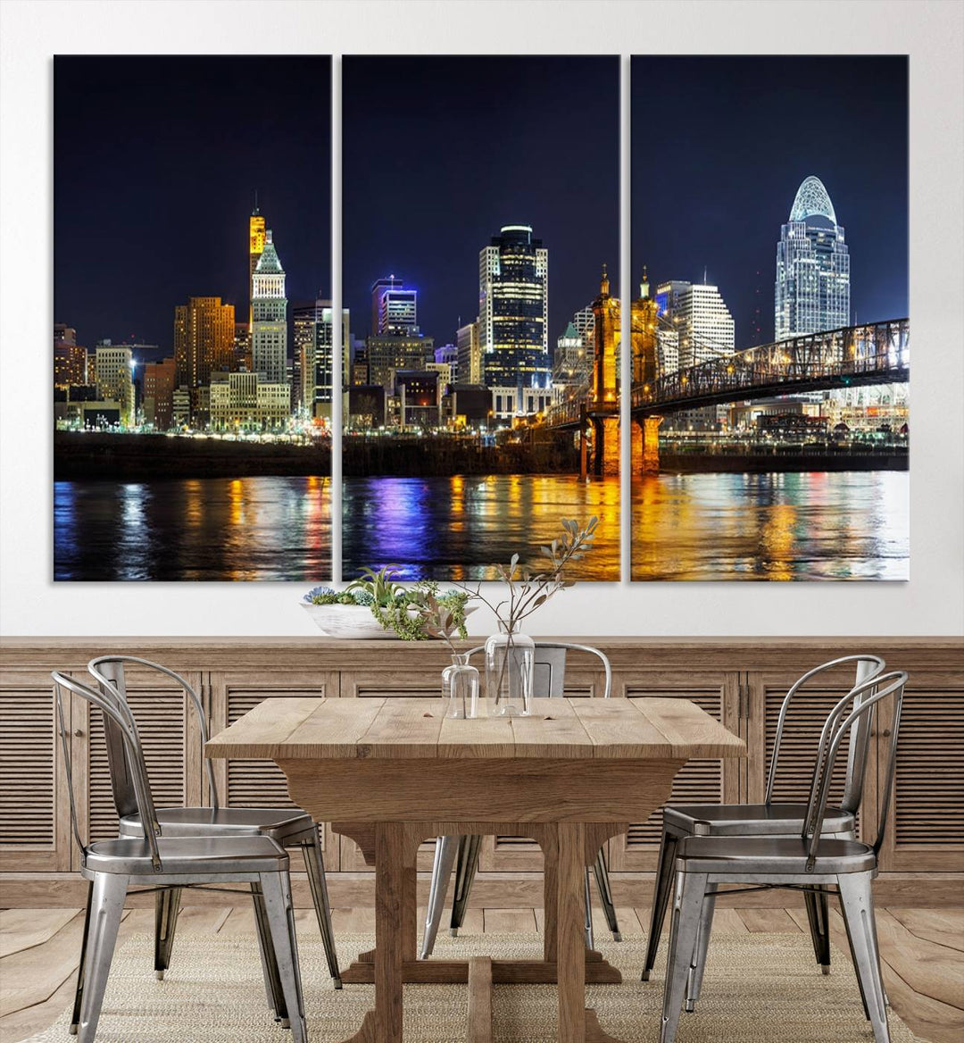 The Cincinnati City Lights Night Skyline Cityscape View Wall Art Canvas Print, crafted on museum-quality canvas with UV-protective coating and ready to hang, adds a touch of sophistication to the wall.