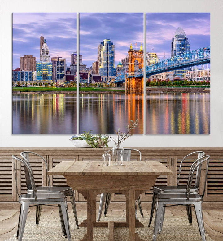 The wall art titled "Cincinnati City Lights Sunset Purple Cloudy Skyline Cityscape View" is beautifully printed on museum-quality canvases with a UV-protective coating and is ready to hang.