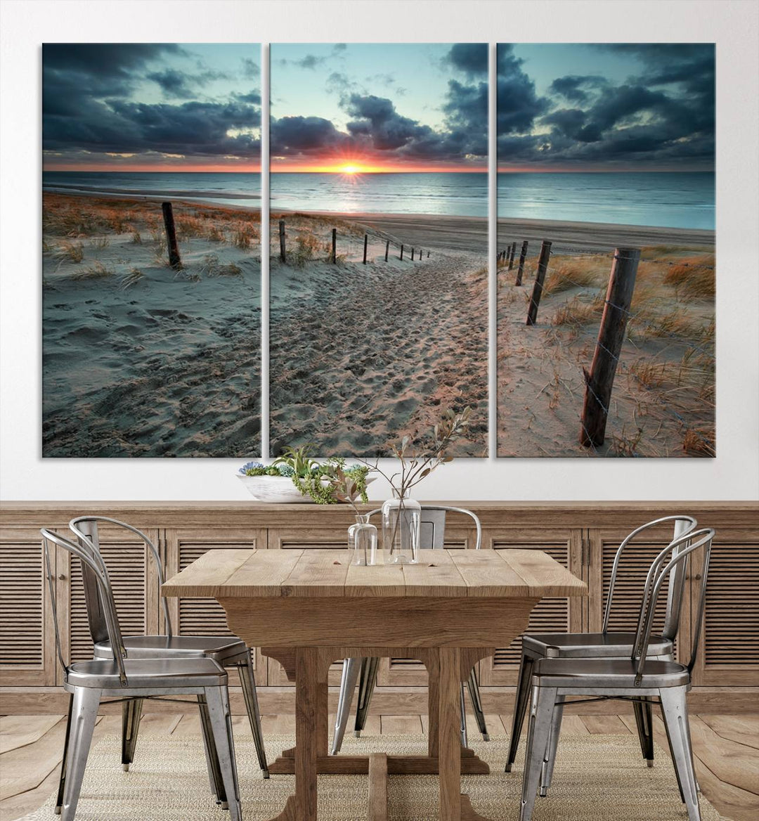 The modern living room features the Cloudy Weather Sunset Beach Wall Art Canvas Print. This museum-quality canvas adds a touch of sophistication with its hand-assembled framed art, ensuring lasting elegance. Enjoy free shipping on this exquisite piece.