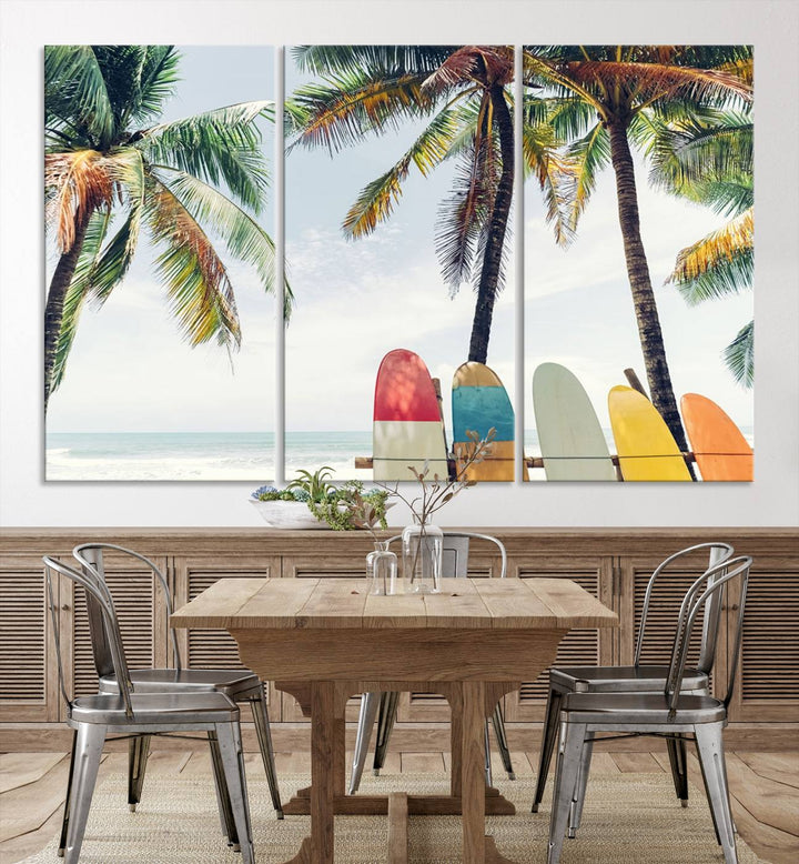 The room showcases The Palm and Surfing Board Wall Art Canvas Print, a triptych of palm trees and surfboards by the beach, elegantly gallery wrapped for a sophisticated finish.