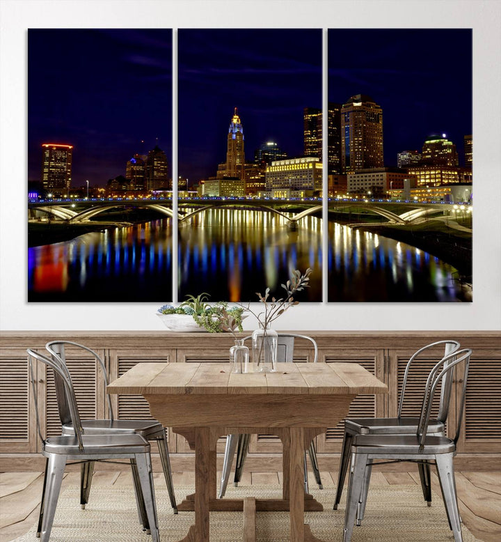 The "Columbus City Lights Night Skyline Cityscape View Wall Art Canvas Print" showcases a stunning city skyline at night, with illuminated buildings and bridges reflecting in the river, on a museum-quality canvas ready to hang.