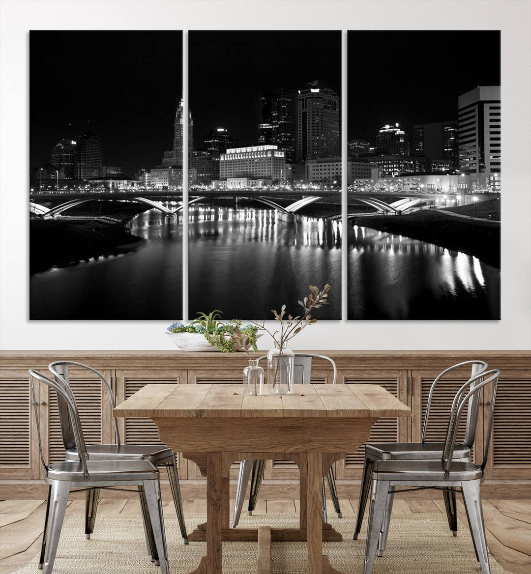 The living room features the "Columbus City Lights Skyline Black and White Wall Art Cityscape Canvas Print" above a coffee table. This artwork is presented as a triptych on museum-quality canvases with UV-protective coating.