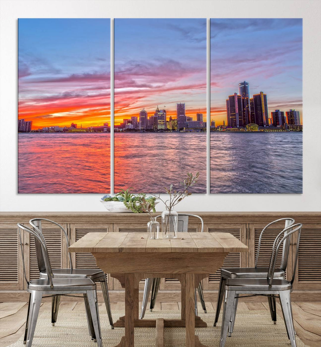 The Detroit City Lights Sunset Colorful Cloudy Skyline Cityscape View Wall Art Canvas Print showcases a vibrant city skyline at sunset over water. The artwork is museum-quality, comes ready to hang, and features a UV-protective coating to preserve its vivid colors.