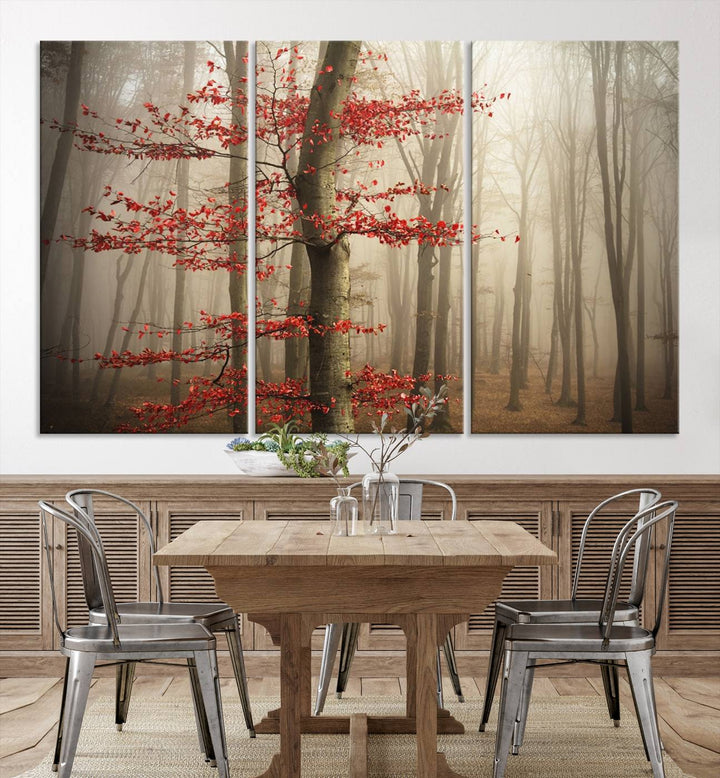 The living room features the Foggy Forest Wall Art, an Autumn Trees Canvas Print that showcases a serene nature scene with foggy woodland decor and a tree adorned in vibrant red leaves.