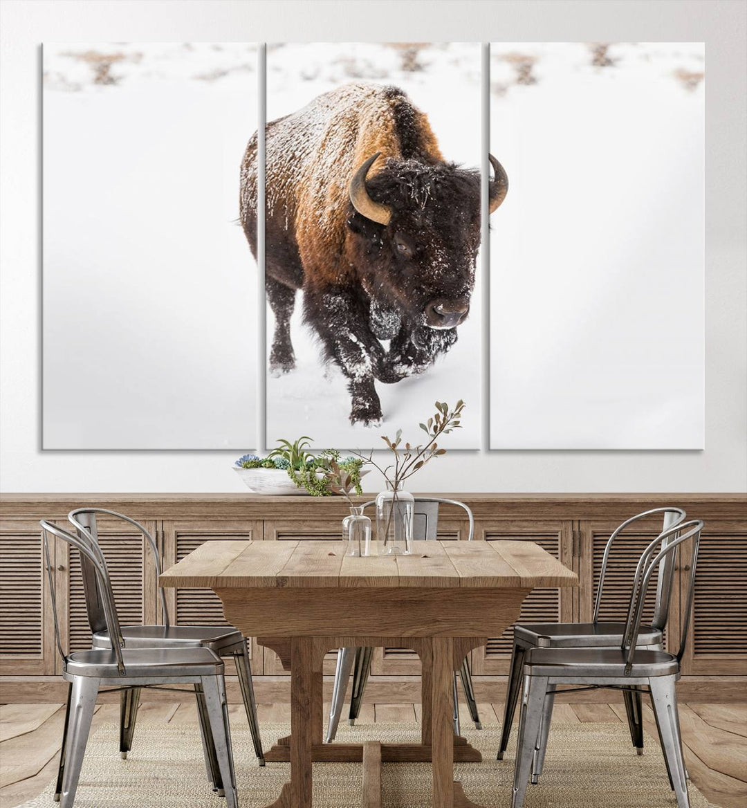 The Bison Winter Wall Art Canvas Print for Farmhouse Decor is displayed as a triptych in the living room. This artwork, printed on museum-quality canvases with a UV-protective coating to maintain its vibrant colors, is the focal point of the space.