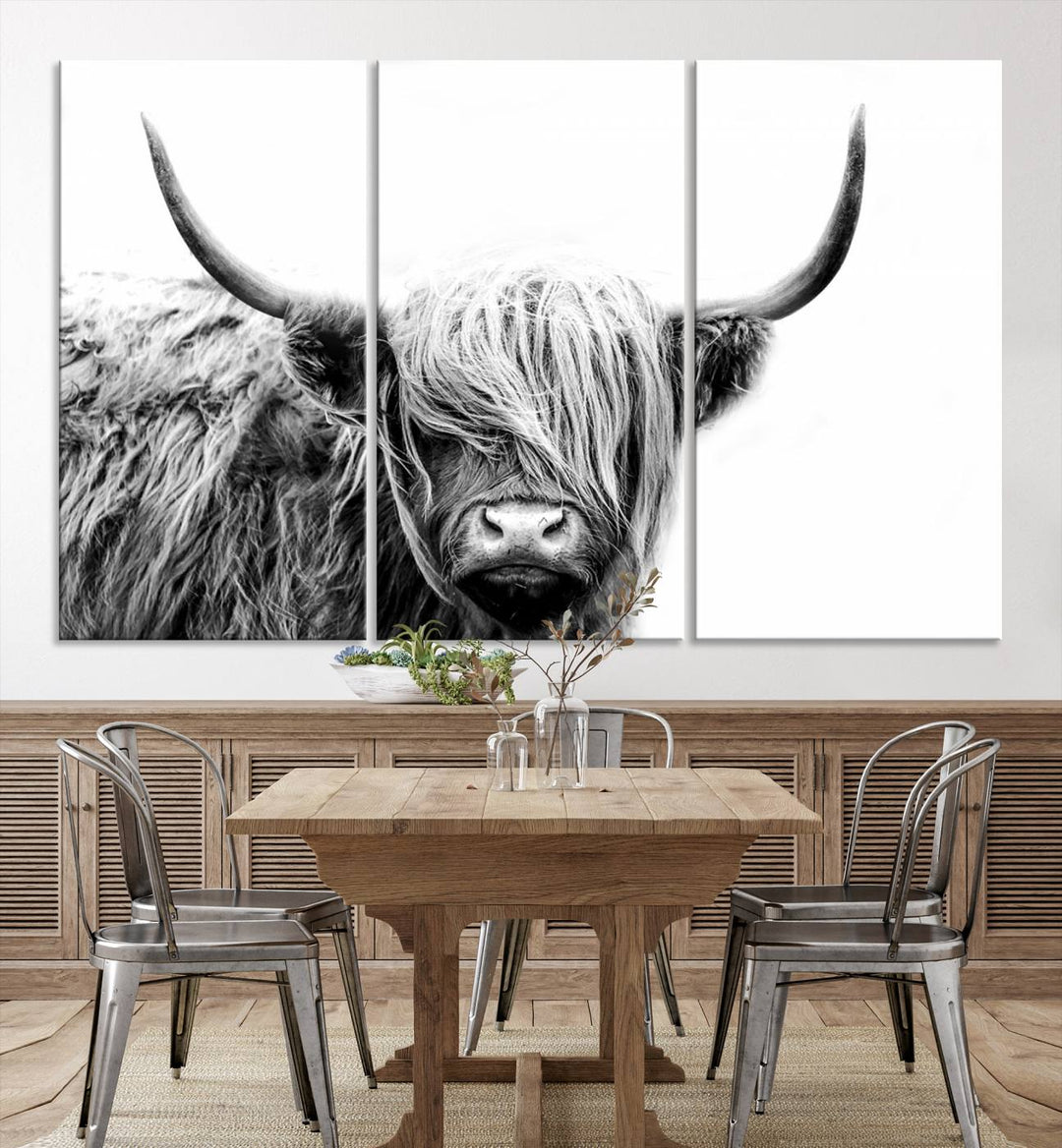 A museum-quality triptych titled "Black White Scottish Highland Cow Cattle Art Print Farmhouse Wall Art Canvas Print" embellishes the dark wall. The canvas is equipped with a UV-protective coating to ensure lasting vibrancy.