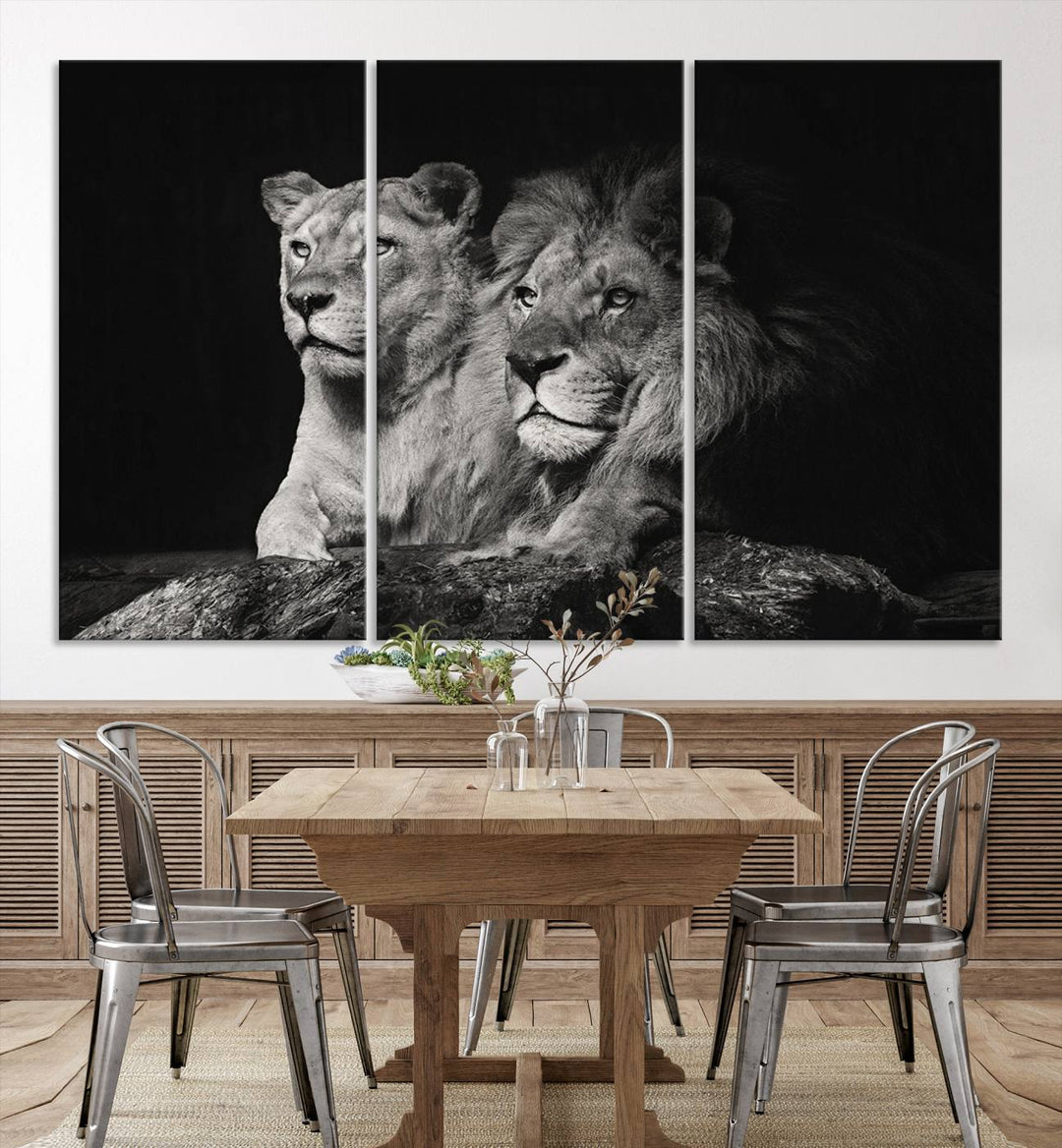 The elegant wildlife portrait, "Lion Couple Canvas Wall Art Print," featuring a black and white depiction of a lion family, majestically decorates the living room wall.