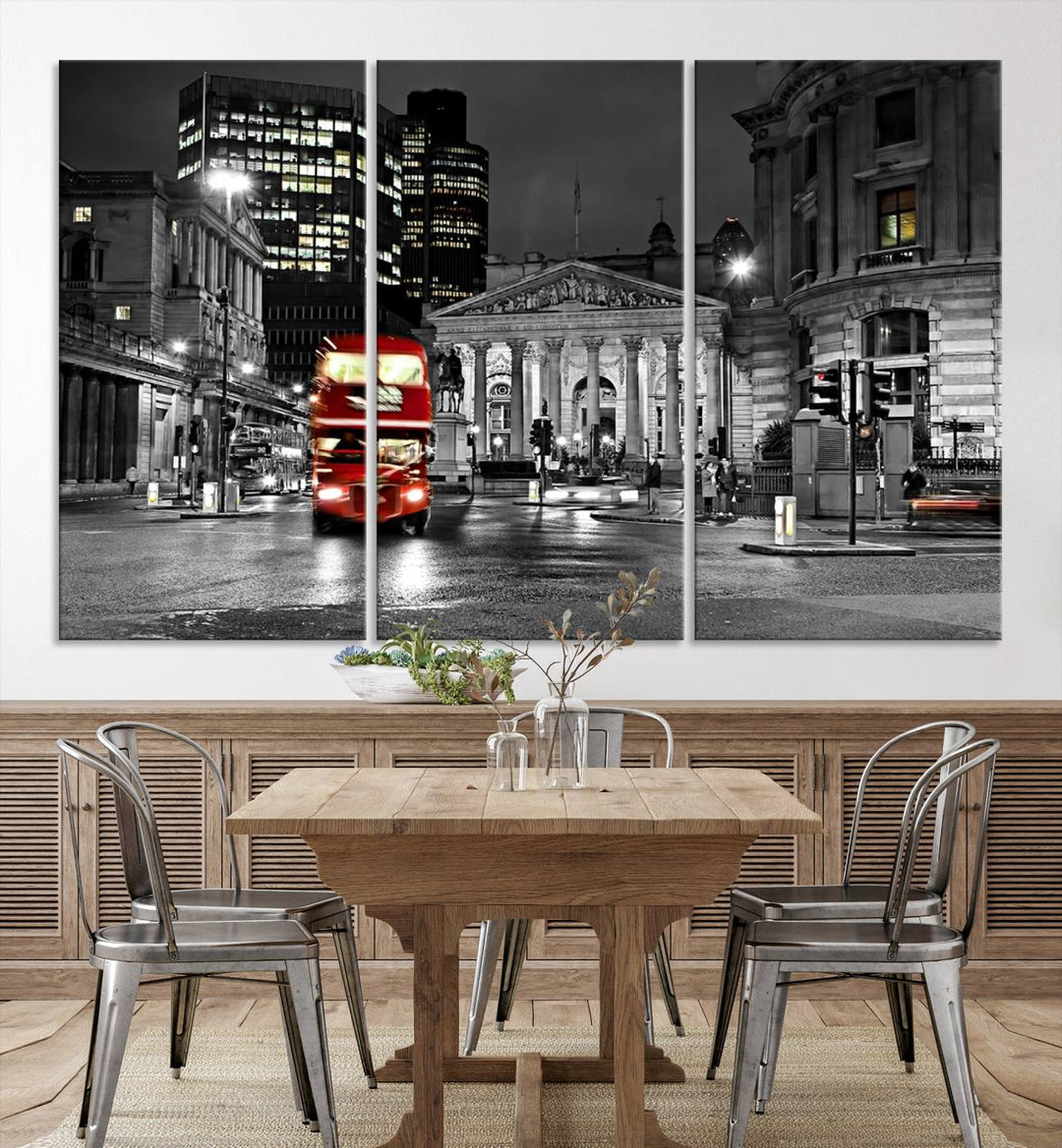 The London Night Red Bus Wall Art Canvas Print features a black and white cityscape with a moving red double-decker bus, crafted on museum-quality canvas with a UV-protective coating. This ready-to-hang artwork is designed to stand out and enhance any space.