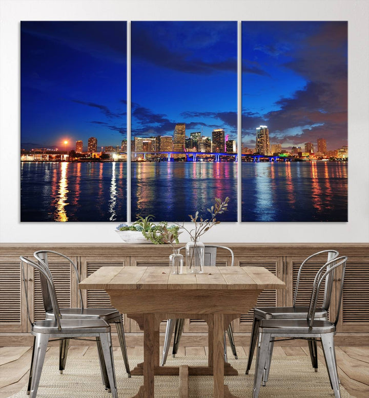 A large Miami City View Wall Art Canvas Print featuring the Miami City Skyline Panorama at night is displayed above the dresser.