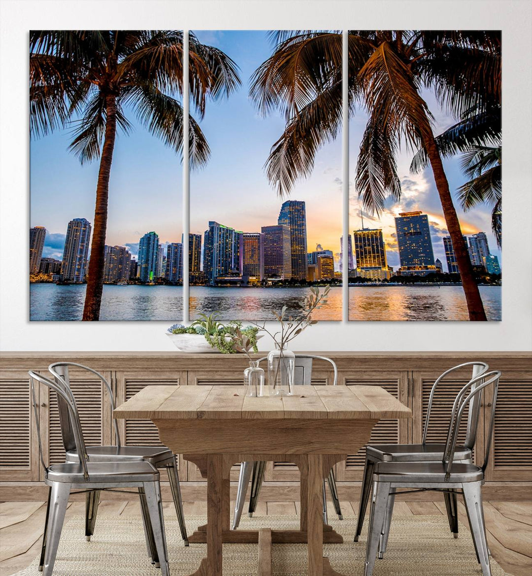 The Wall Art MIAMI Canvas Print features a triptych design depicting palm trees and a city skyline at sunset.