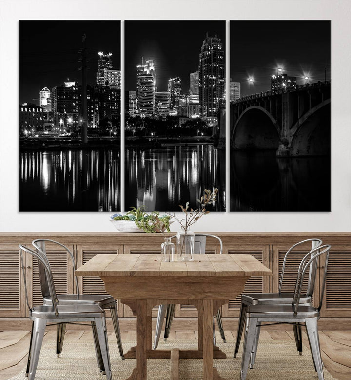 The "Minneapolis Wall Art Canvas Print, Minnesota City Wall Art Print, Minnesota Cityscapes Wall Art" features a black and white triptych of a city skyline with a bridge. Crafted on museum-quality canvas, this gallery-wrapped artwork is finished with a UV-protective coating to ensure lasting beauty.