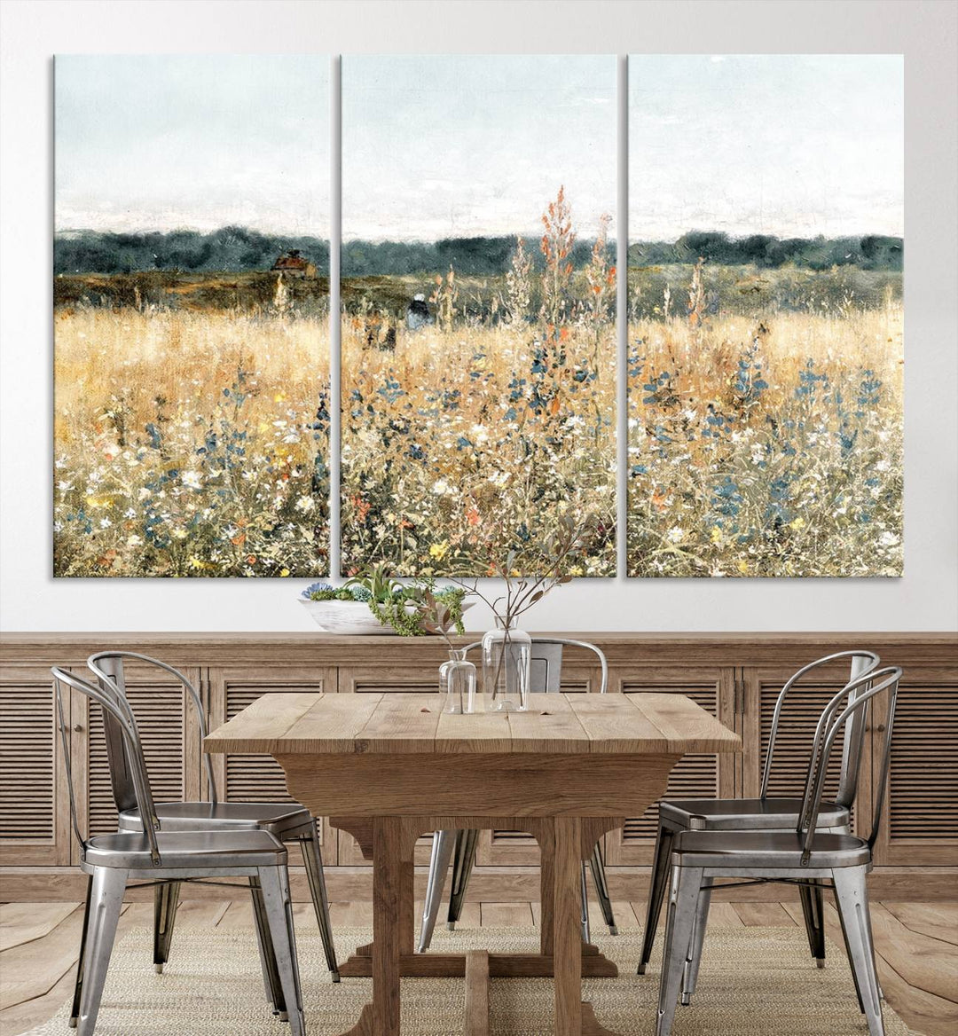 The "Wildflower Field Wall Art Canvas" brings rustic charm to the room with its nature-inspired landscape print, making it a perfect addition to the living room or office.