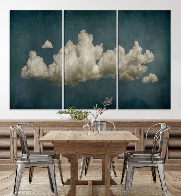 The Vintage Green Clouds Wall Art Canvas Print, set against a teal backdrop, showcases breathtaking canvas artwork with a gallery-quality finish.