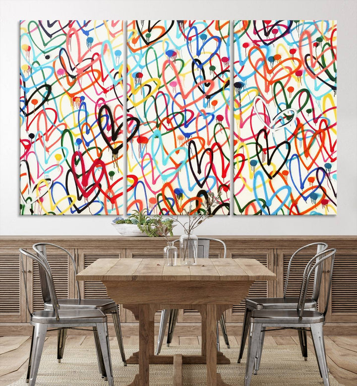 The "Colorful Love Canvas print," featuring vibrant abstract street art with overlapping loops, is handmade in the USA.