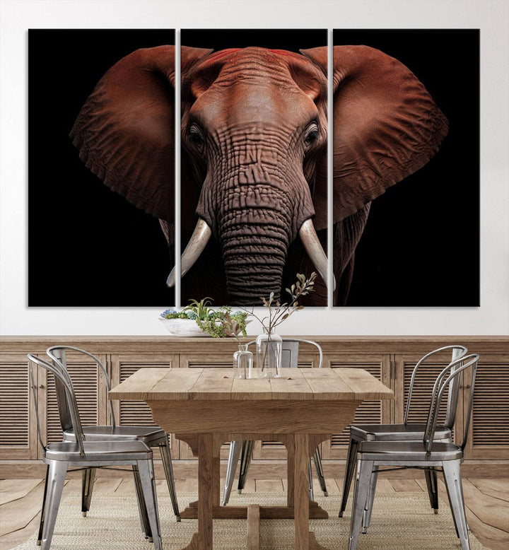 A stunning triptych titled "Wild Elephant Wall Art Canvas Print" beautifully enhances the wall above a contemporary living room. This Africa Savannah Wild Animal Wall Decor Print is of museum-quality, complete with a UV-protective coating to ensure its vibrancy and beauty are preserved for years.