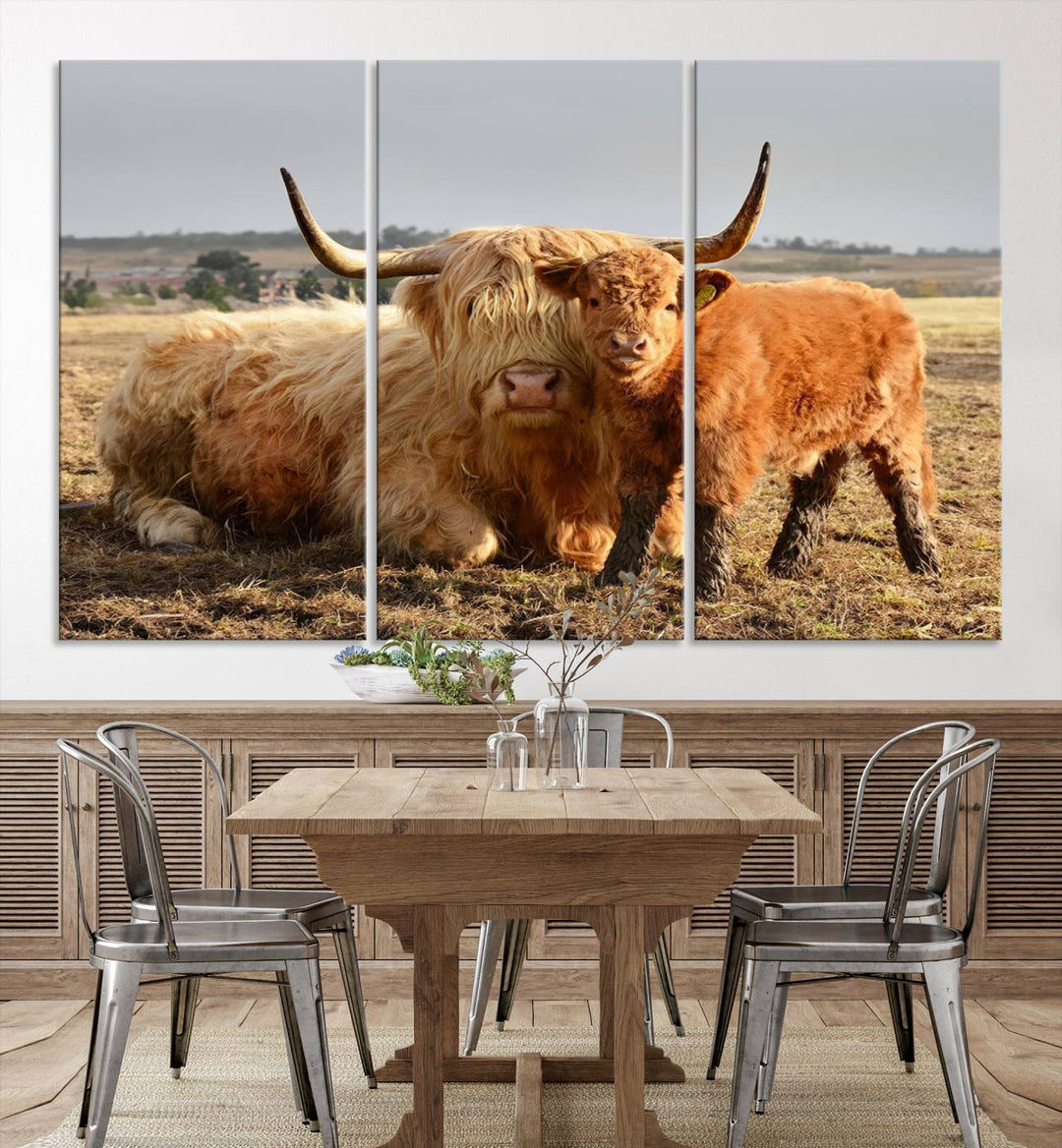 The three-panel canvas artwork, titled "Highland Cow Canvas Wall Art Animal Print for Farm House Decor," features a serene scene of a resting Highland cow and calf in a field. The piece highlights its gallery-quality finish.