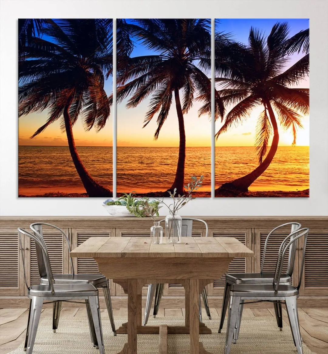 The living room features a wall adorned with the "Wall Art Canvas Curve Palms at Sunset on Beach," showcasing gallery-wrapped, museum-quality canvases in a stunning triptych.