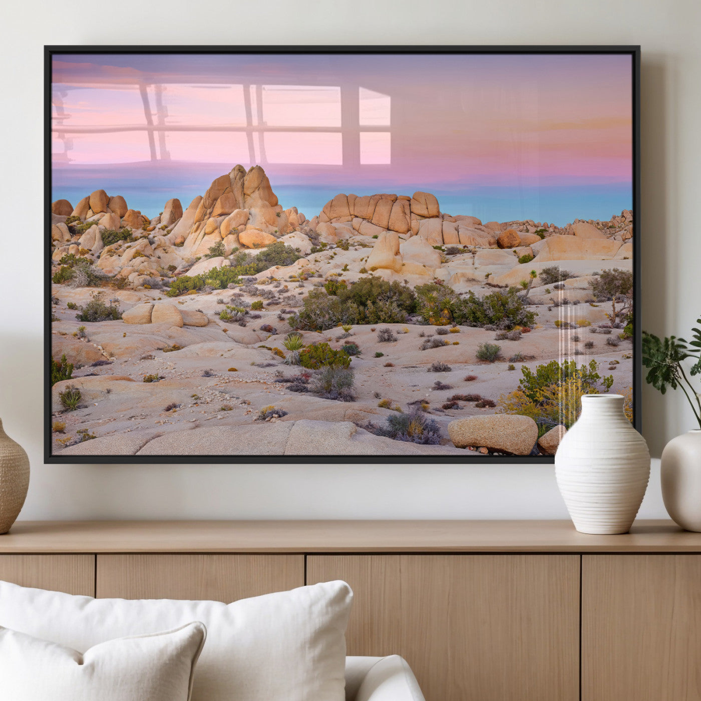 A breathtaking desert landscape featuring rugged rock formations under a vibrant pastel sunset sky, capturing the warmth and serenity of a Southwestern wilderness.