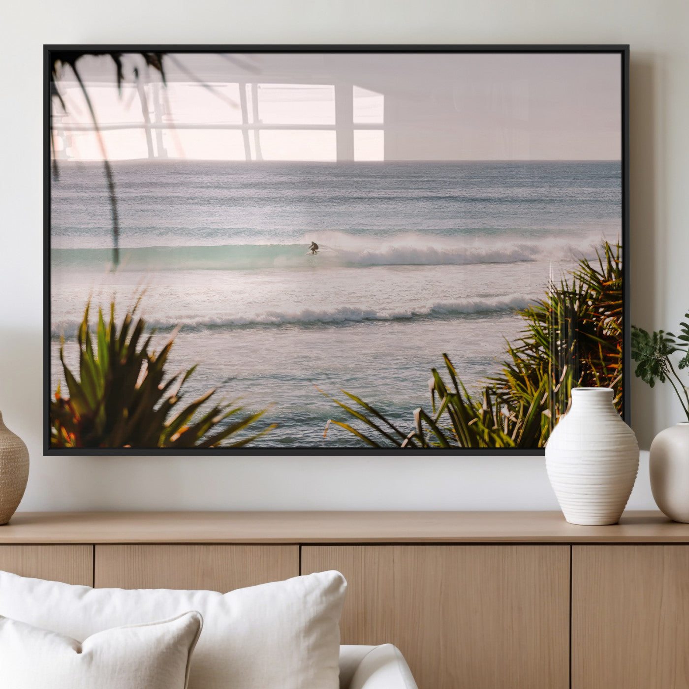 Canvas of a lone surfer riding a pastel wave at sunrise, perfect for tropical or coastal-themed spaces with a relaxed, airy vibe.