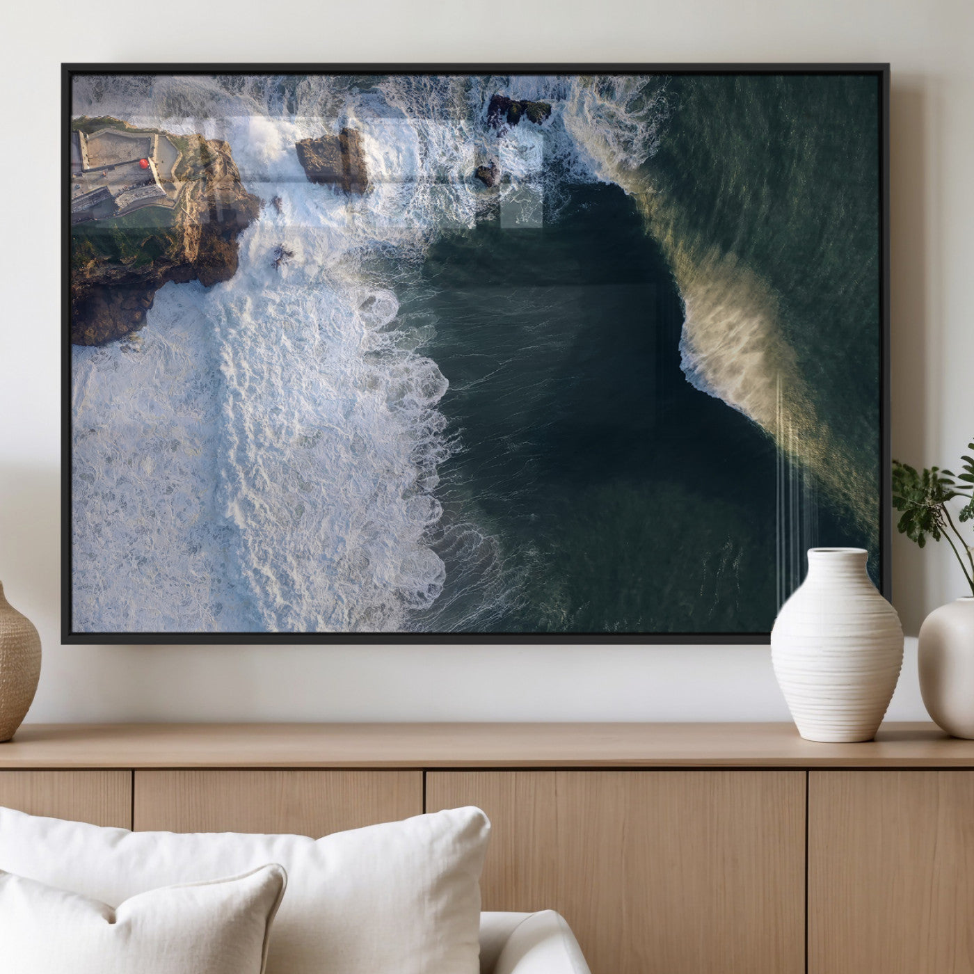 Canvas showing an aerial view of crashing waves along the Nazaré coastline, perfect for dramatic coastal or ocean-themed home decor.