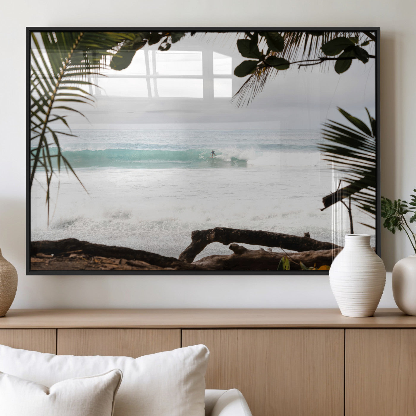 Tropical beach view with palm trees and surfer riding a wave, perfect for boho or coastal-inspired interior wall decor.