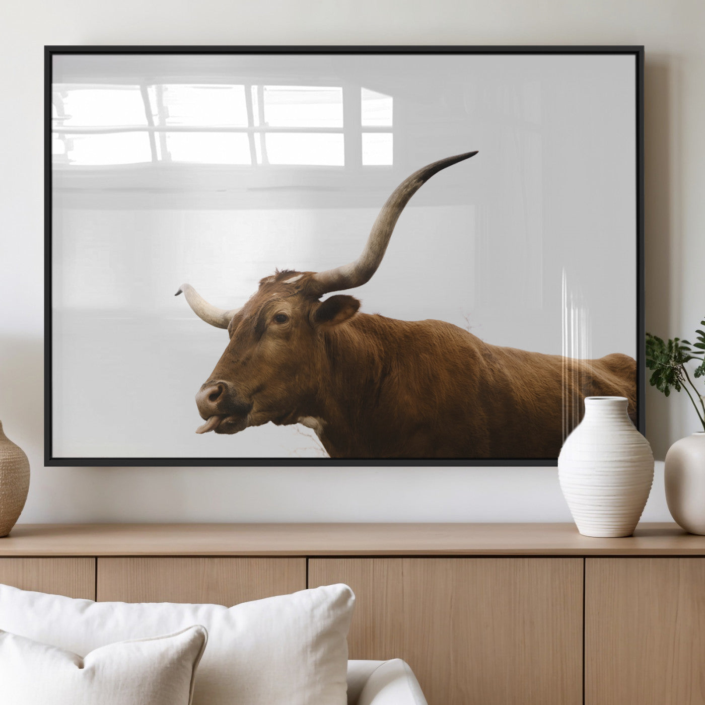 Side view of a brown Longhorn cow with curved horns on white background, perfect for rustic farmhouse or western-style home decor.