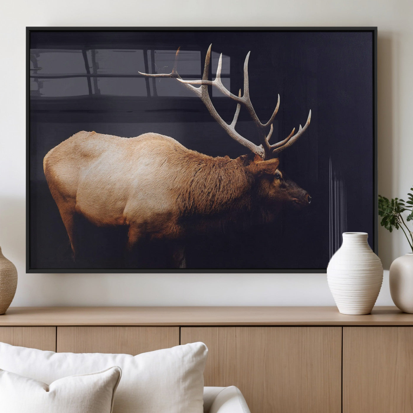 Side profile of an elk with large antlers on dark background, creating a bold rustic statement for cabin or Western-themed decor.