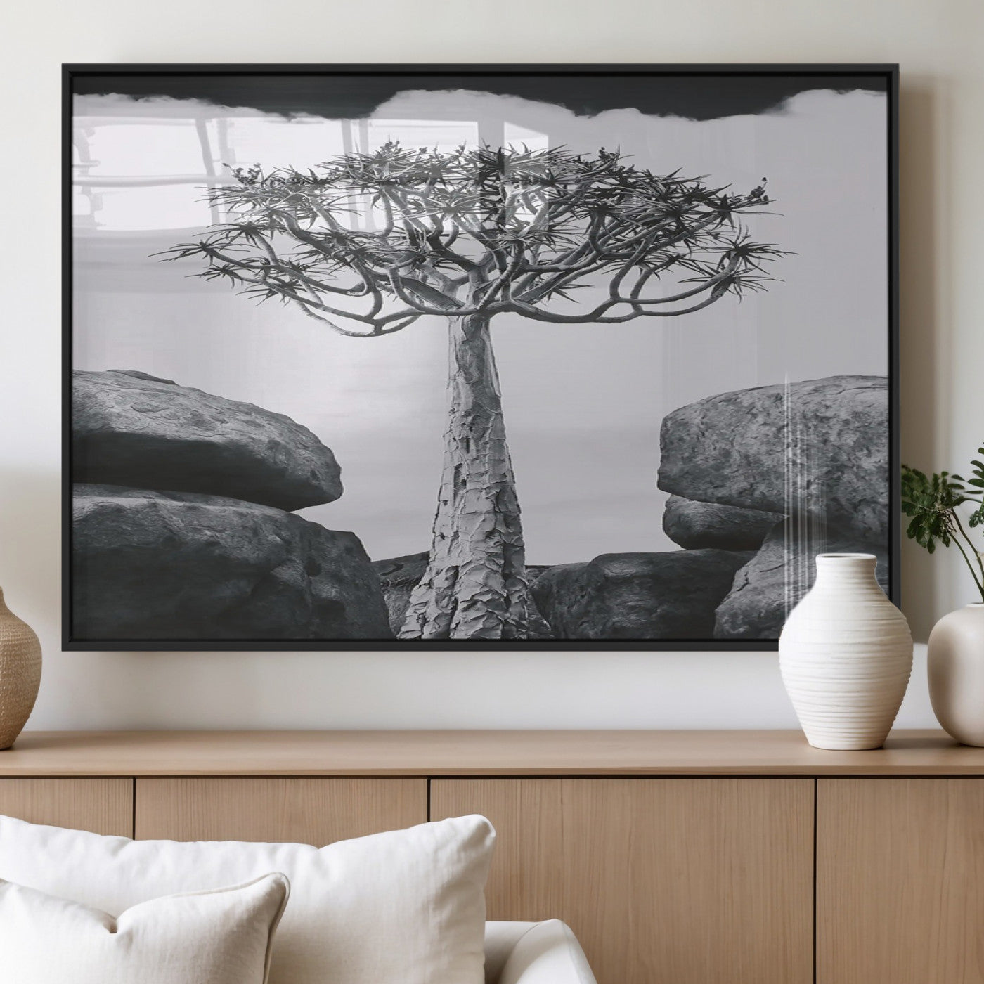 Black and white Joshua tree with bold rocky background, ideal for minimalist or desert-inspired home wall decoration.