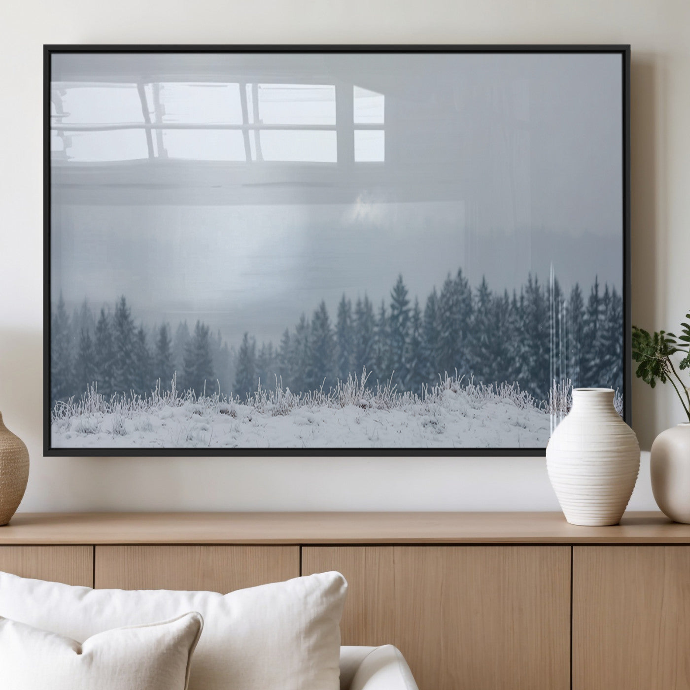 Snow-covered forest under misty sky, soft light breaking through clouds, ideal for minimalist or Nordic-inspired home decor.
