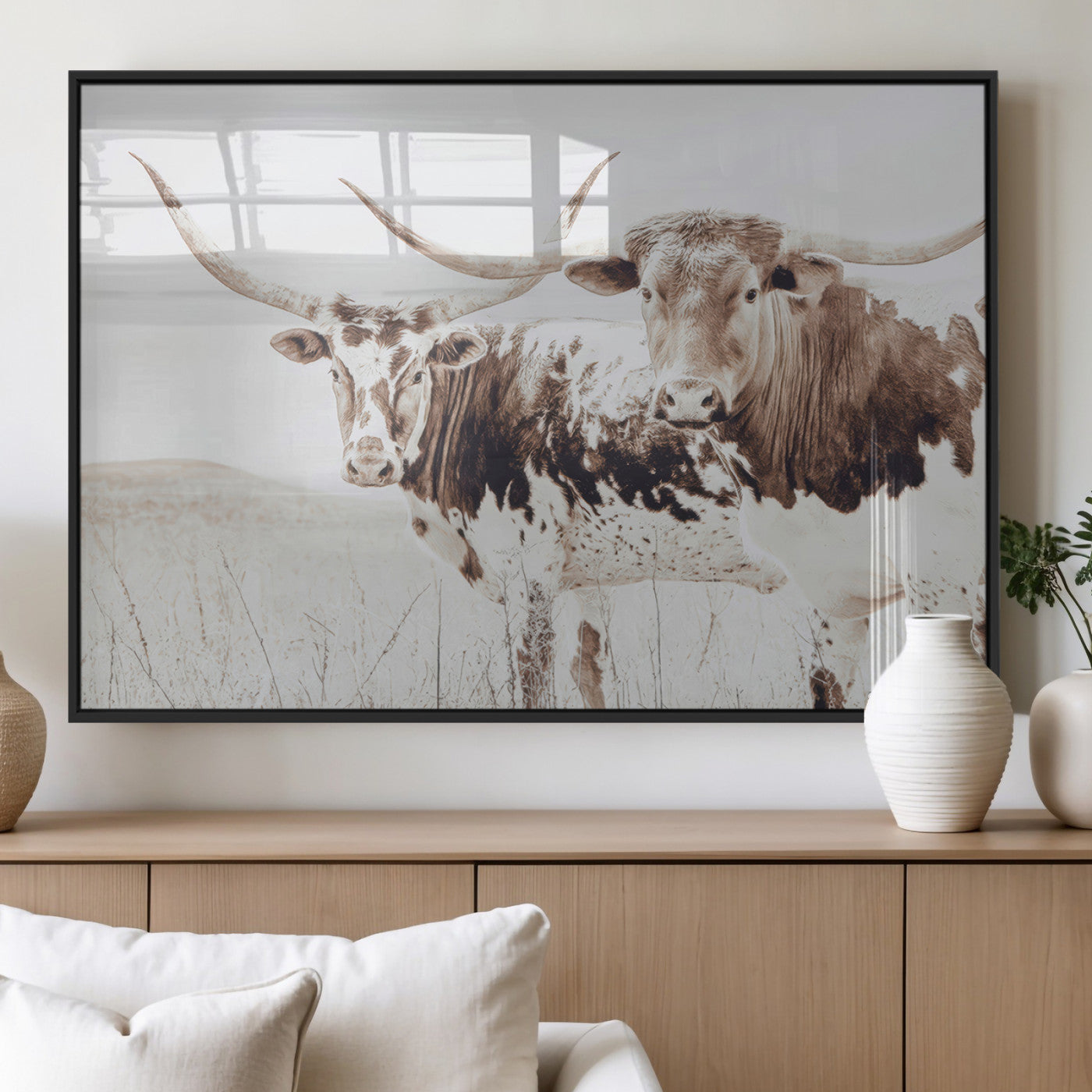 Two longhorn cows standing in a sepia-toned pasture with soft light, ideal for rustic or farmhouse-themed neutral wall decor.