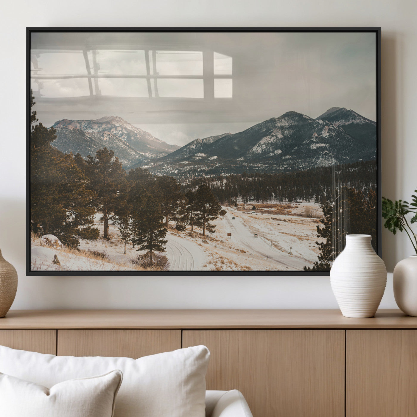Snow-covered mountains with pine trees and a winding path, creating a serene and rustic winter landscape perfect for cozy decor.