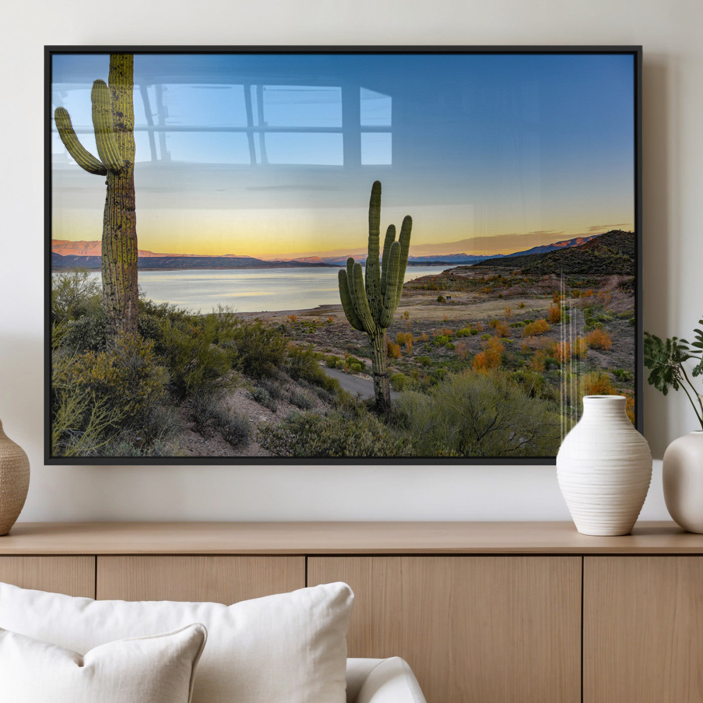 Desert landscape with saguaro cacti and lake at sunset, featuring vibrant sky and hills, ideal for Southwestern or rustic wall decor.