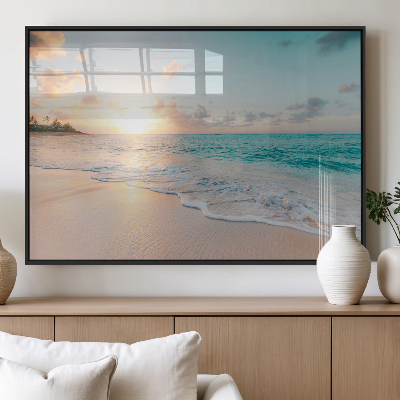 Golden sunset over a tropical beach with gentle ocean waves and soft white sand, creating a peaceful and relaxing coastal scene.