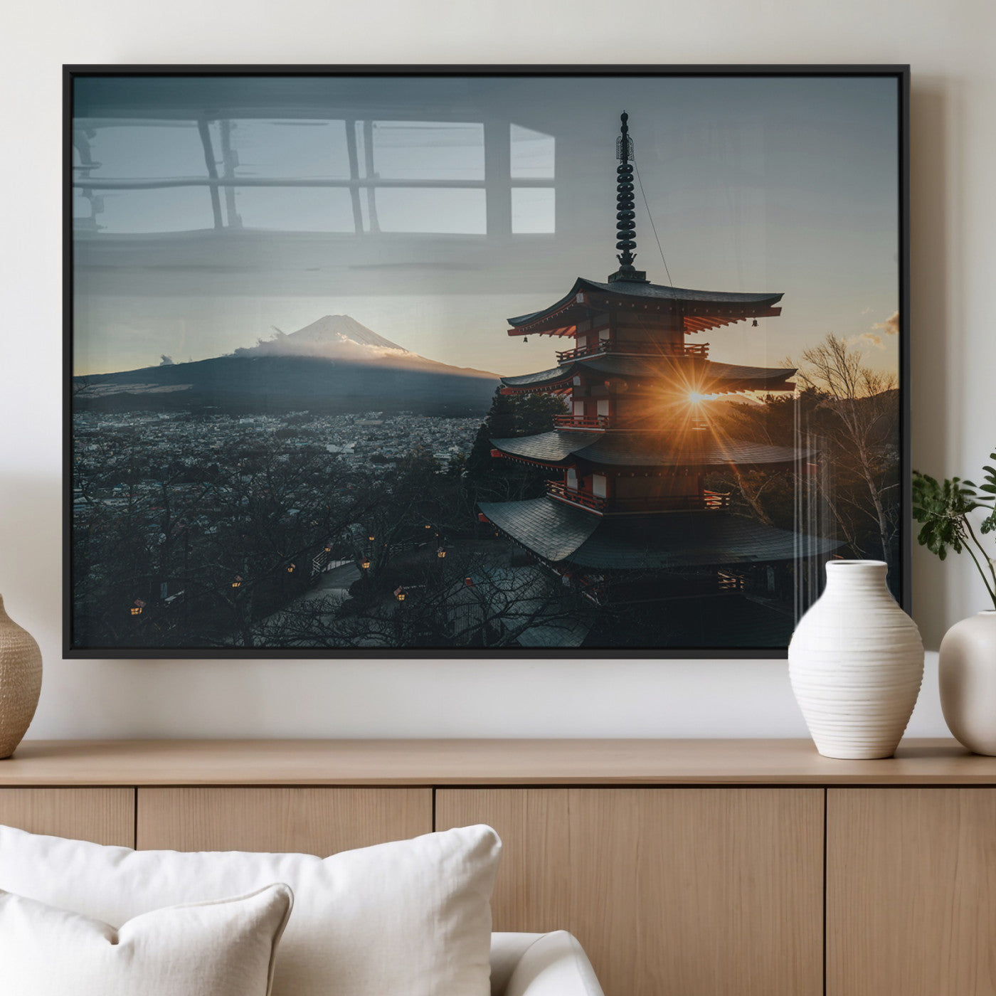 Chureito Pagoda at sunset with Mount Fuji in the background, city lights below, and golden sun rays, ideal for Japanese-inspired wall art.