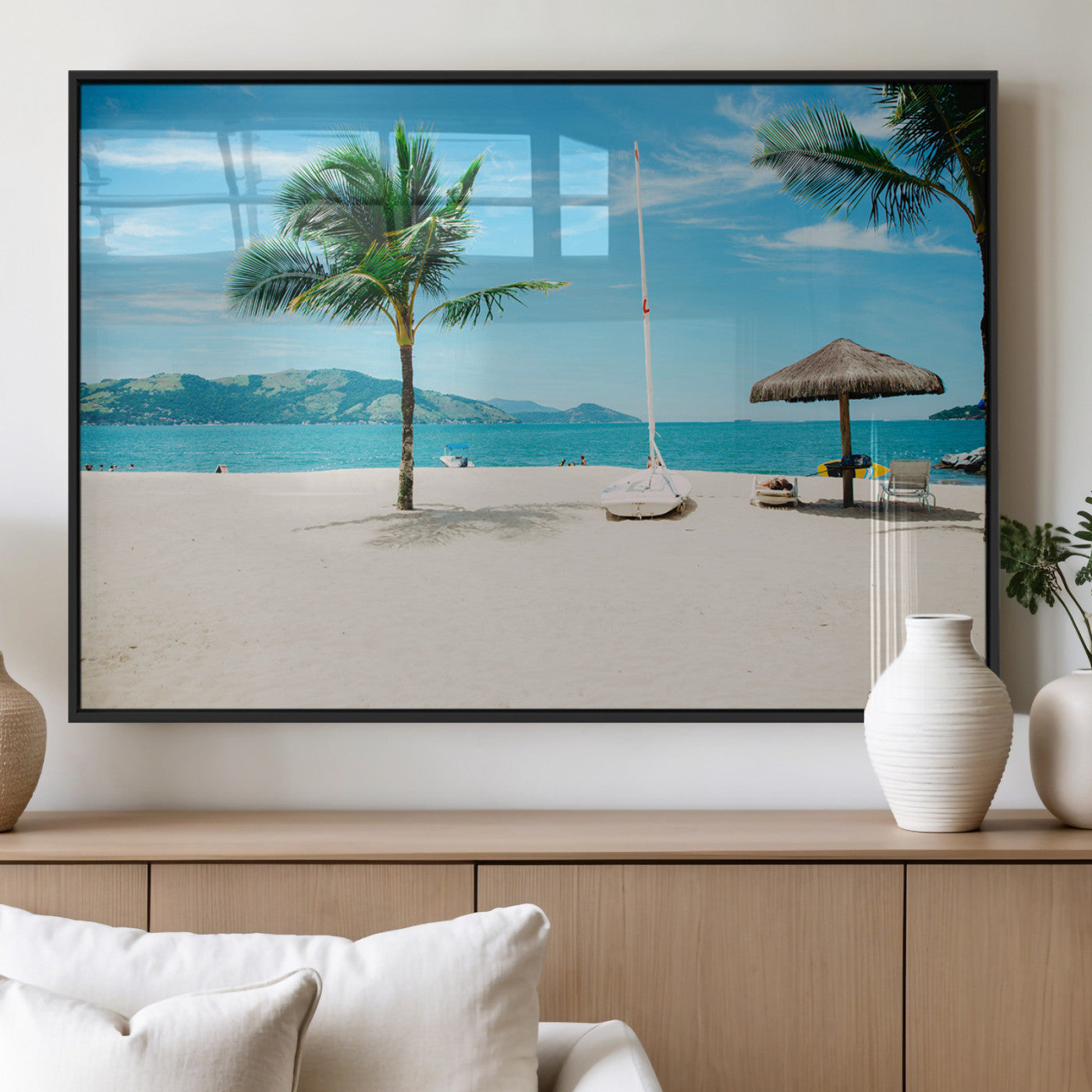 Tropical beach scene with palm trees, a white sailboat, and turquoise ocean waters under a bright blue sky, creating a peaceful summer vibe.